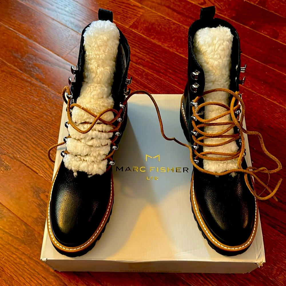 Genuine Leather lace up boots with shearling by Marc Fisher.
Authentic.